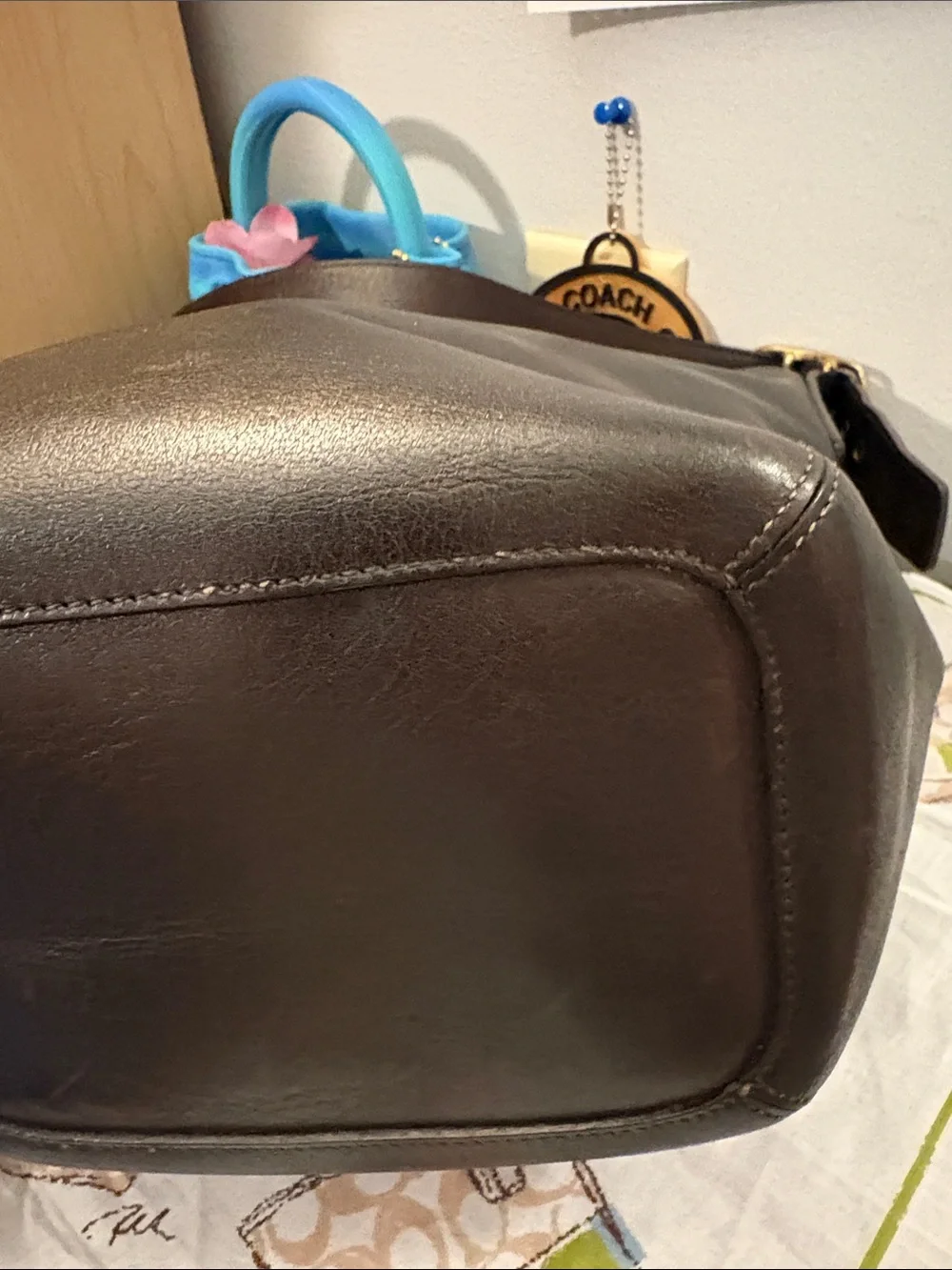 vintage Coach 1992 Duffle Sac bucket bag crafted from dark leather with classic